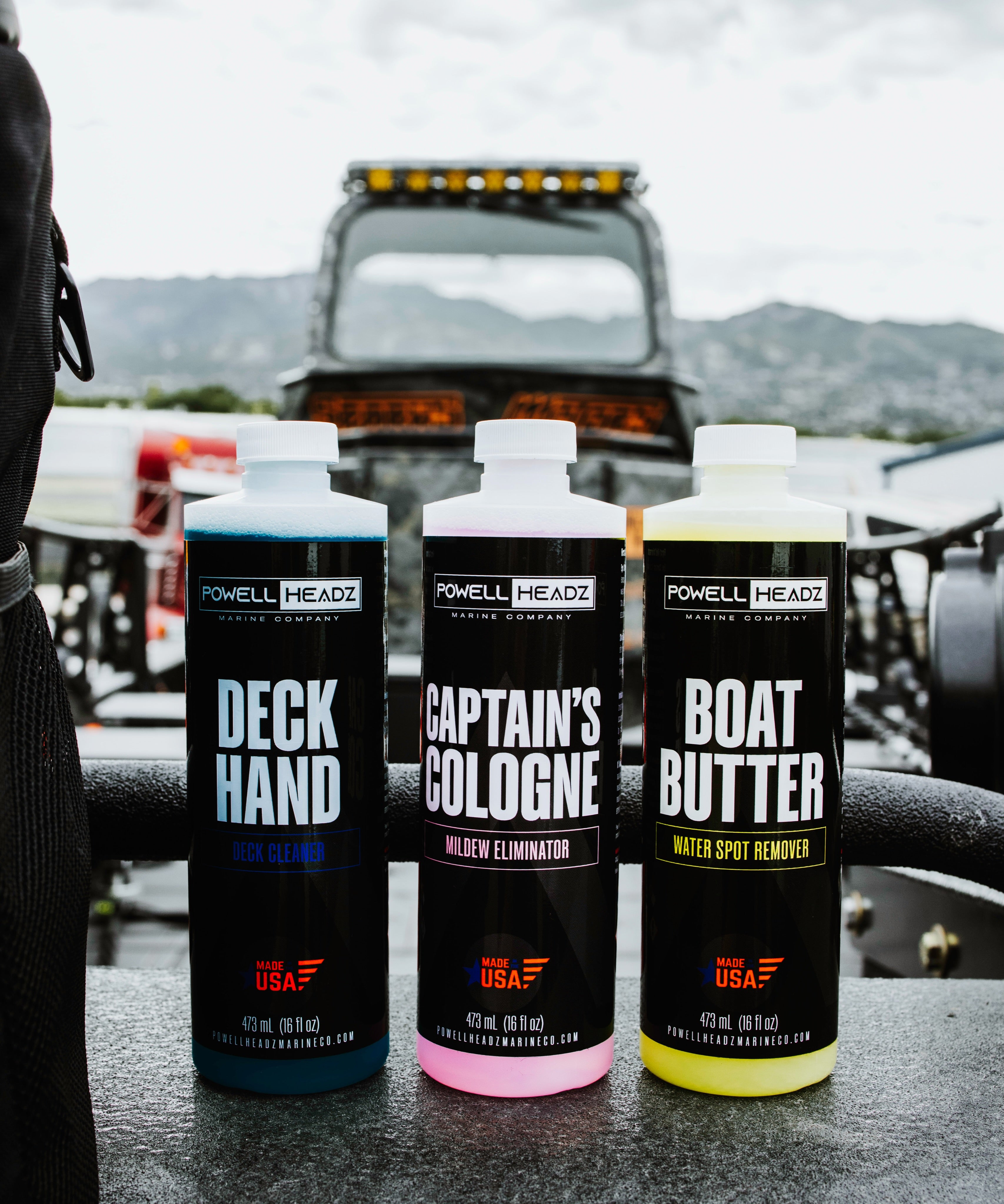 Three Powell Headz cleaner bottles on a boat, shared by @usefuljunkco
