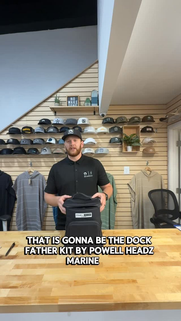 BoardCo presenter holding the Dock Father bag